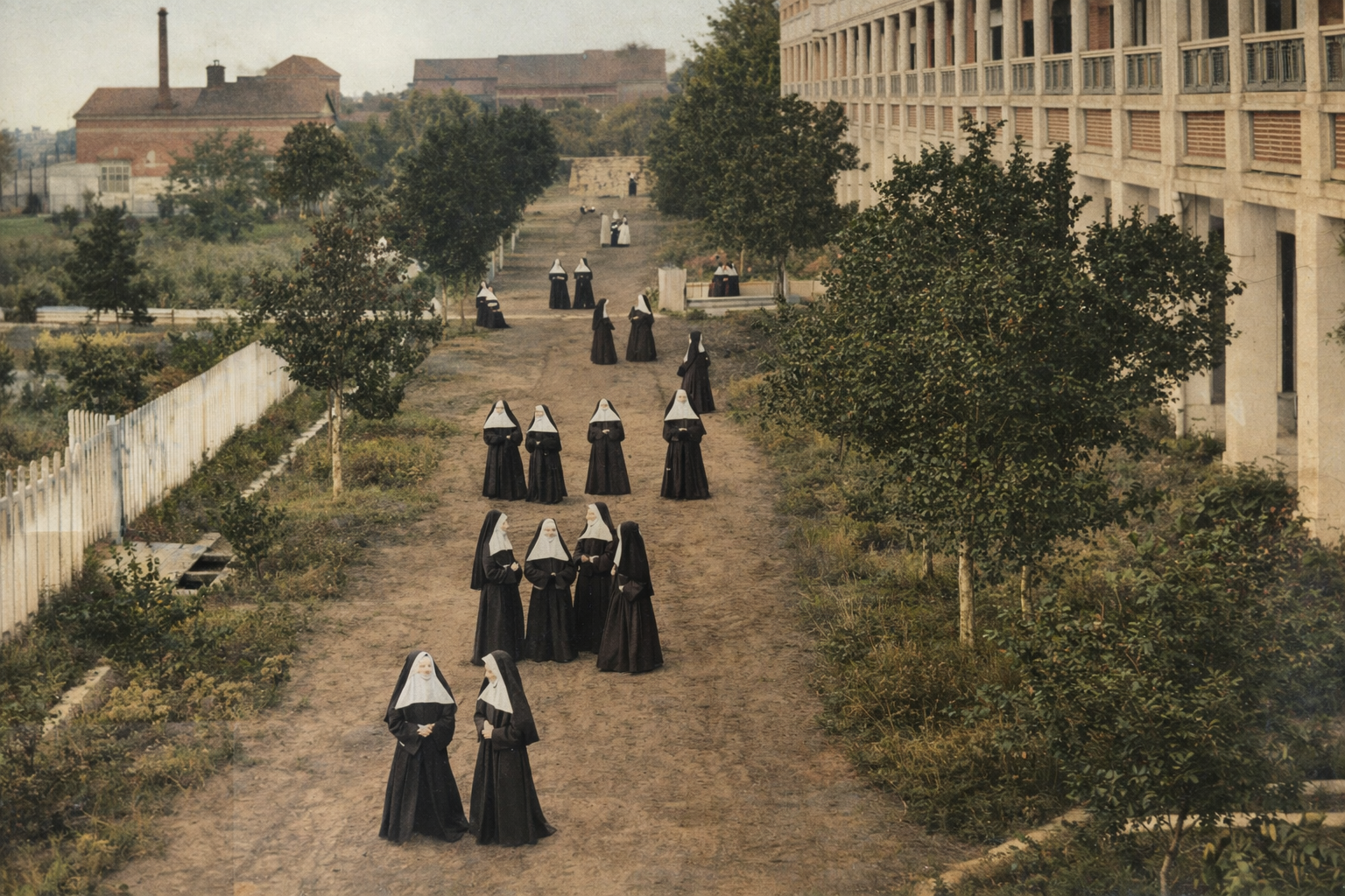 Nuns in black habits walk and converse in a tree-lined courtyard beside a large brick building, under a cloudy sky.