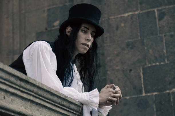 A male vampire gazing over a balcony