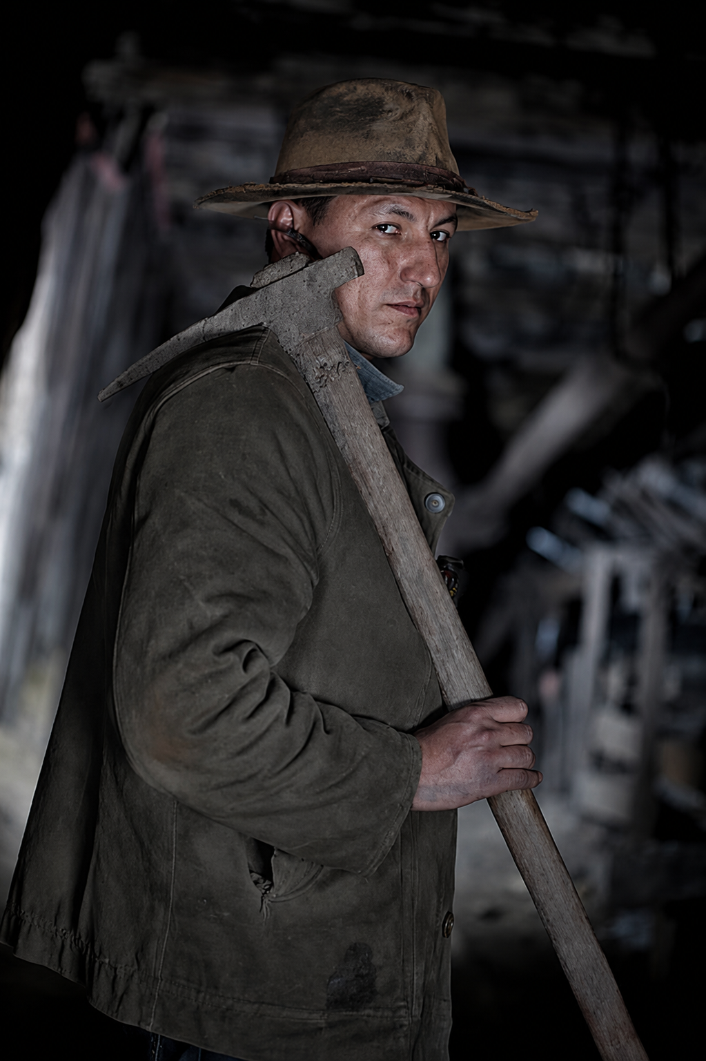 A young man in a mining outfit
